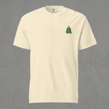 Ivory Ghosts T-shirt front against a grey concrete wall